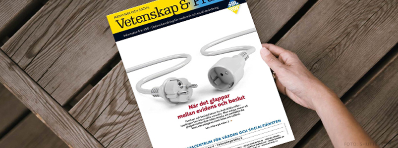 Omslag av tidningen på ett bord